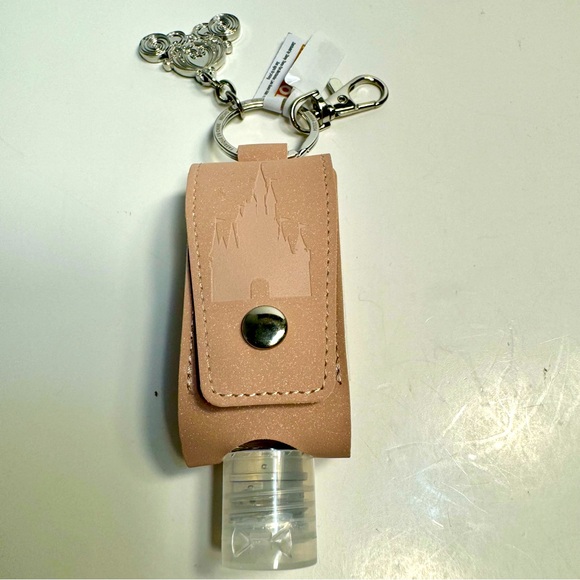 NWT. Disney Cinderella Castle Magical Place Sanitizer 1oz Keychain bag charm. - Picture 1 of 14